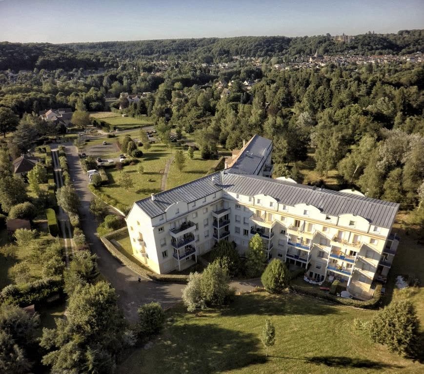 Aerial view of the residence in its grounds